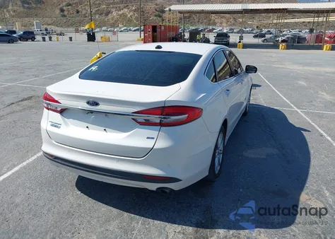 2017 Ford Fusion Se Phev z USA, uszkodzony, nr VIN 3FA6P0PUXHR179924